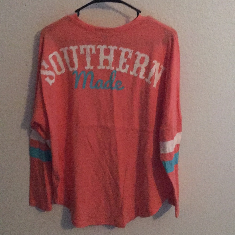 Star scene salmon colored long sleeve knit top M